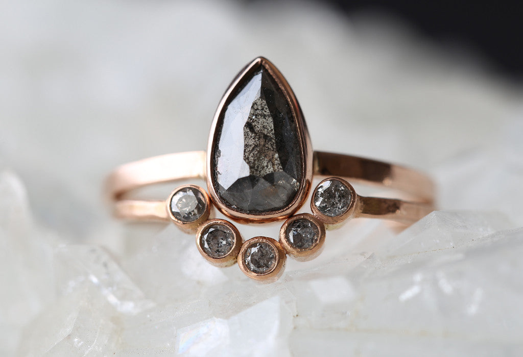 Rose Gold Diamond Bezel Arc Ring stacked with black diamond engagement ring