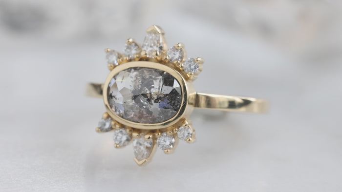 The Lotus Ring with an Oval-Cut Salt and Pepper Diamond