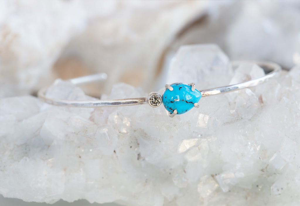 Sterling Silver Asymmetrical Turquoise and Diamond Cuff on White Crystal
