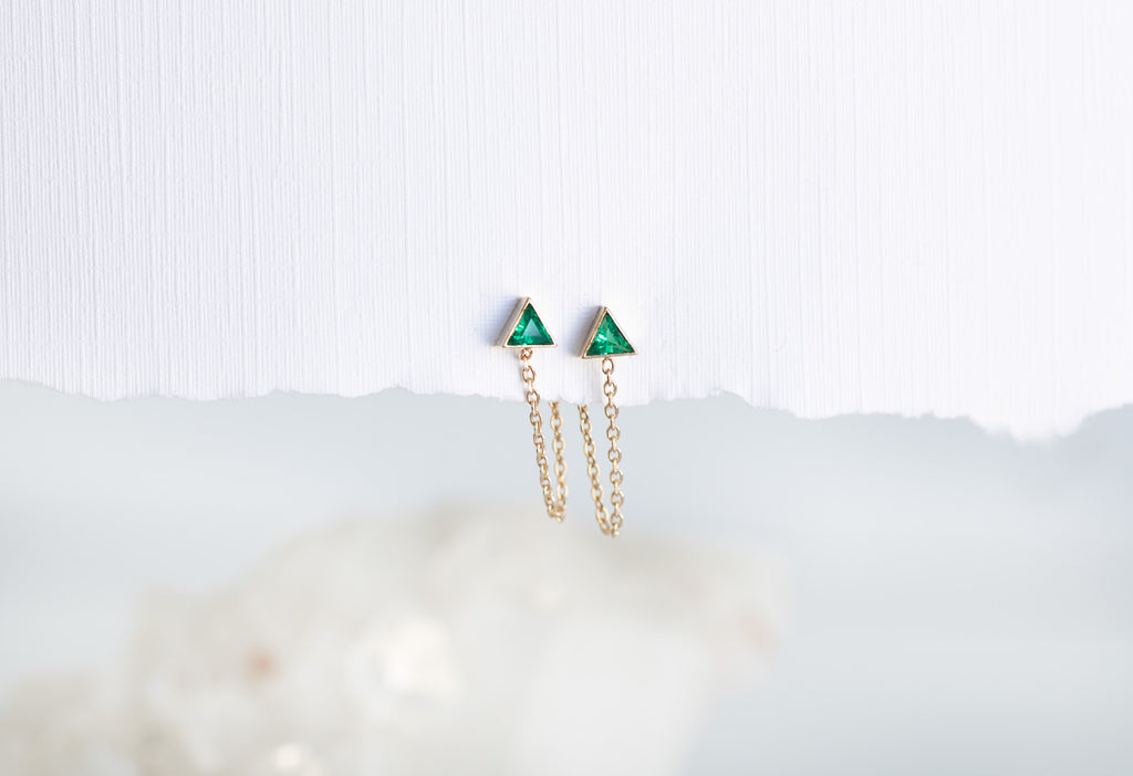 Emerald Trillion Chain Hoop Earrings on Paper