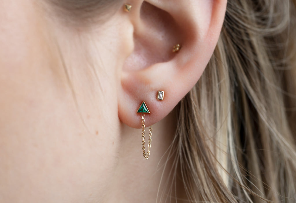 Emerald Trillion Chain Hoop Earrings on Model