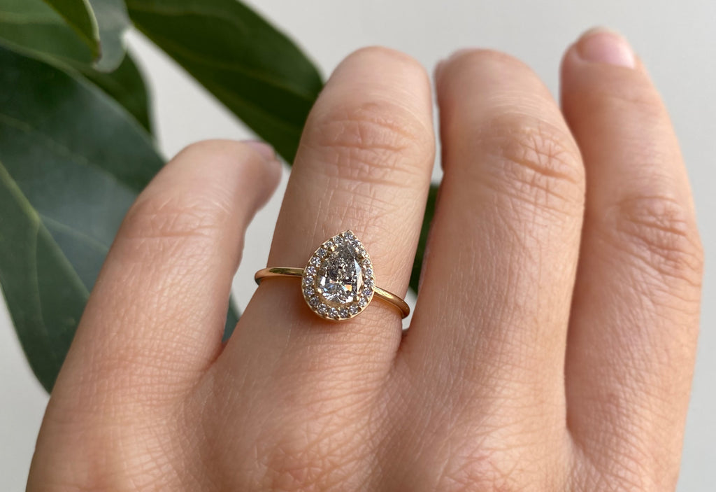 One Of A Kind Pear Cut White Diamond Engagement Ring with Halo