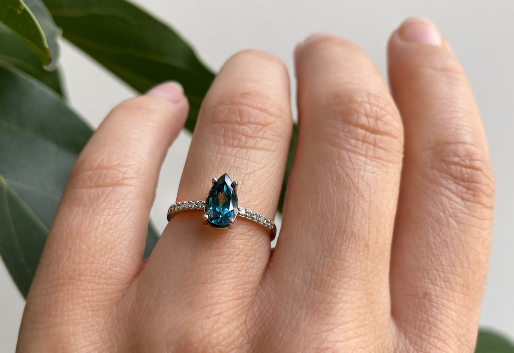 Pear Cut Sapphire Engagement Ring with Pavé Diamond Band