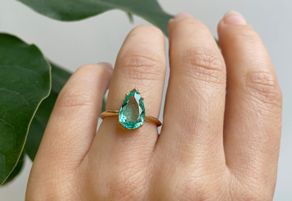 The Sage Ring with a Pear Cut Emerald
