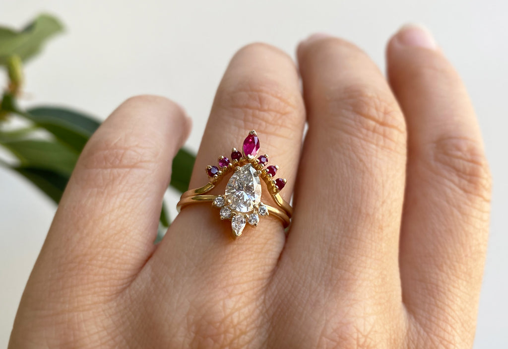 Yellow Gold RUby Gemstone Sunburst STacking Band stacked with white diamond engagement ring on model