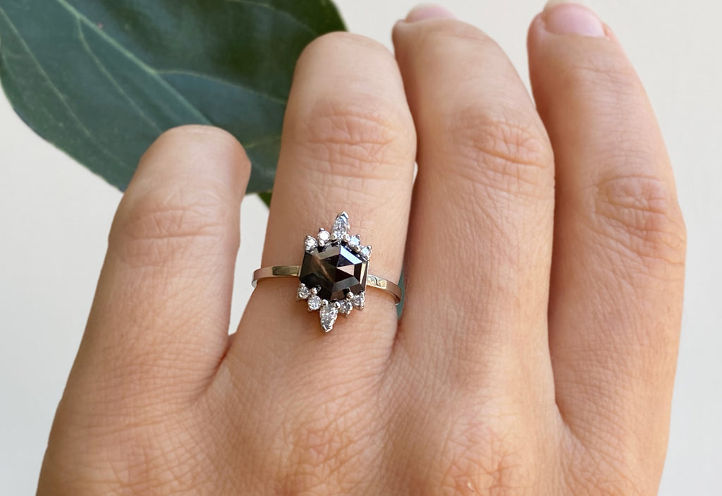 Hexagon-Cut Opalescent Black Diamond Engagement Ring with White Sunbursts