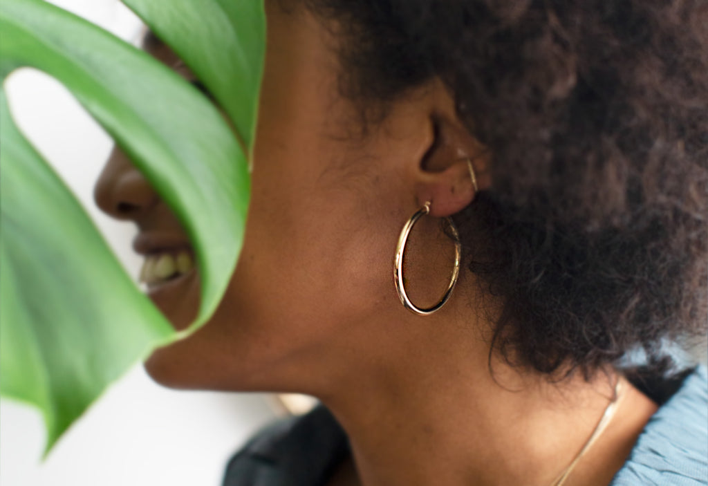 Large Yellow GOld Hoops Earrings on Model