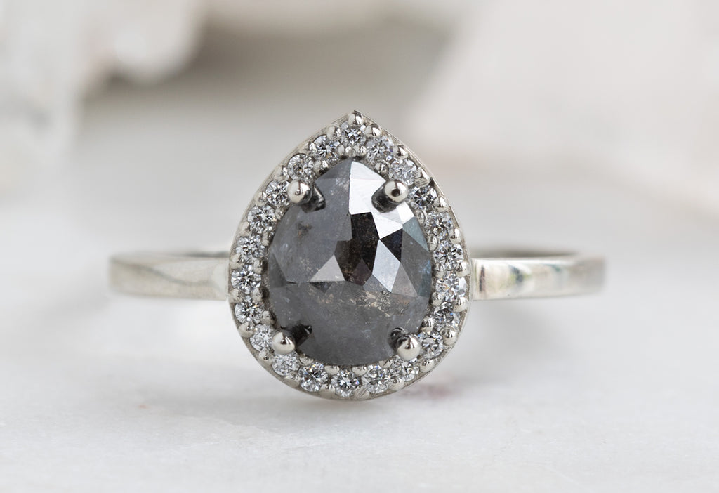 The Dahlia Ring with a Pear Cut Black Diamond