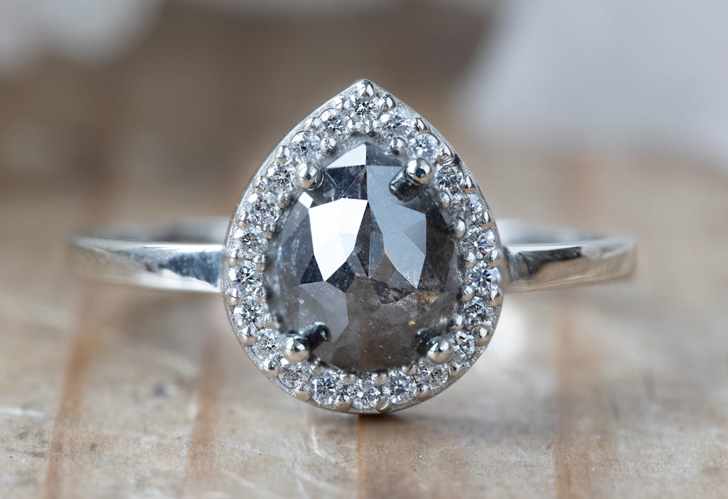 The Dahlia Ring with a Pear Cut Black Diamond