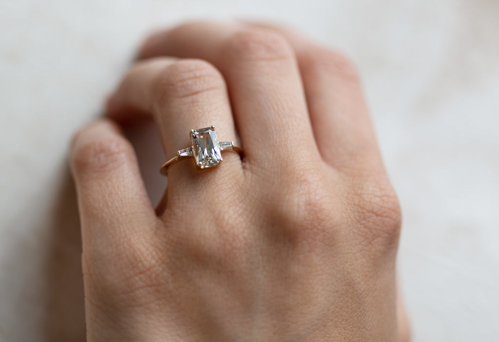 The Ash Ring with an Emerald Cut Tanzanite