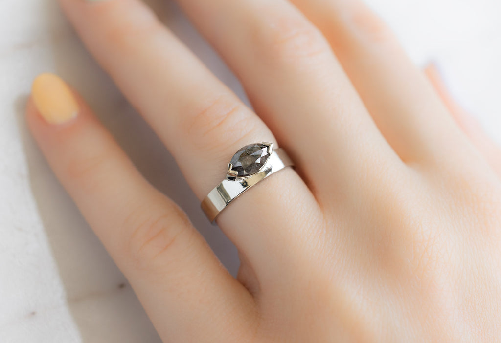 One Of A Kind Cigar Band with a Black Marquise Diamond on Model