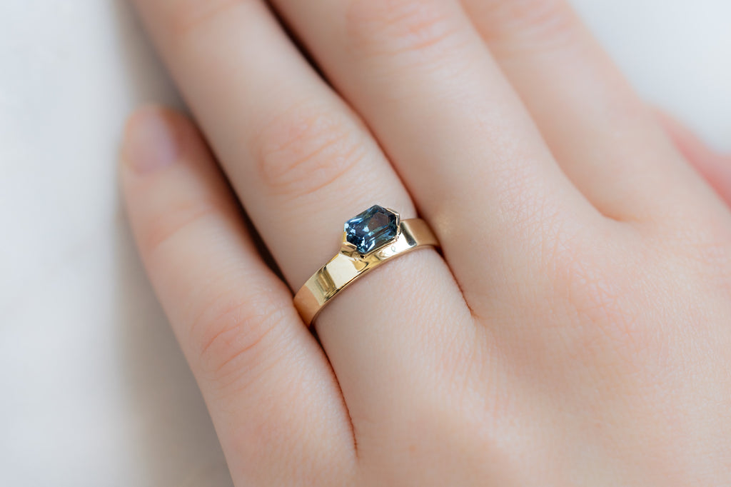 One Of A Kind Cigar Band with a Sapphire Hexagon on Model