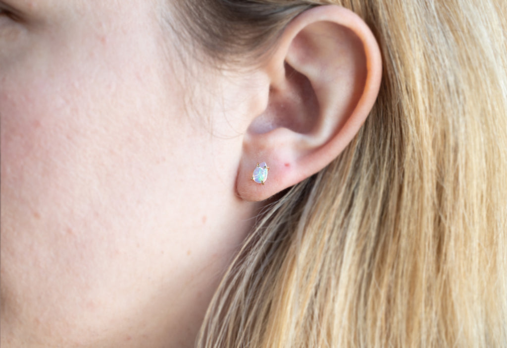 Opal Teardrop Stud Earrings on Model