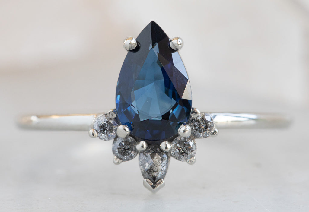 Pear Cut Sapphire Engagement Ring with Attached Diamond Sunburst