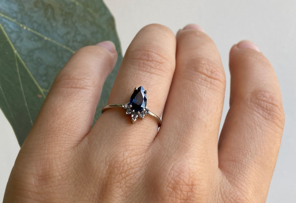 Pear Cut Sapphire Engagement Ring with Attached Diamond Sunburst