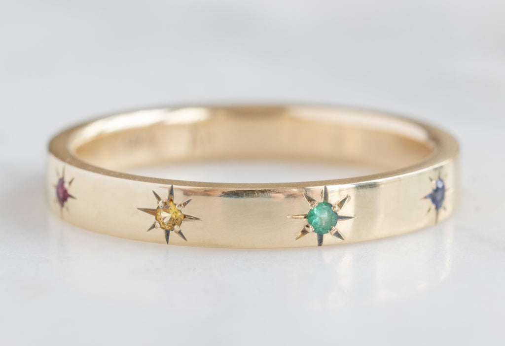 Rainbow Star Setting Band on White Marble