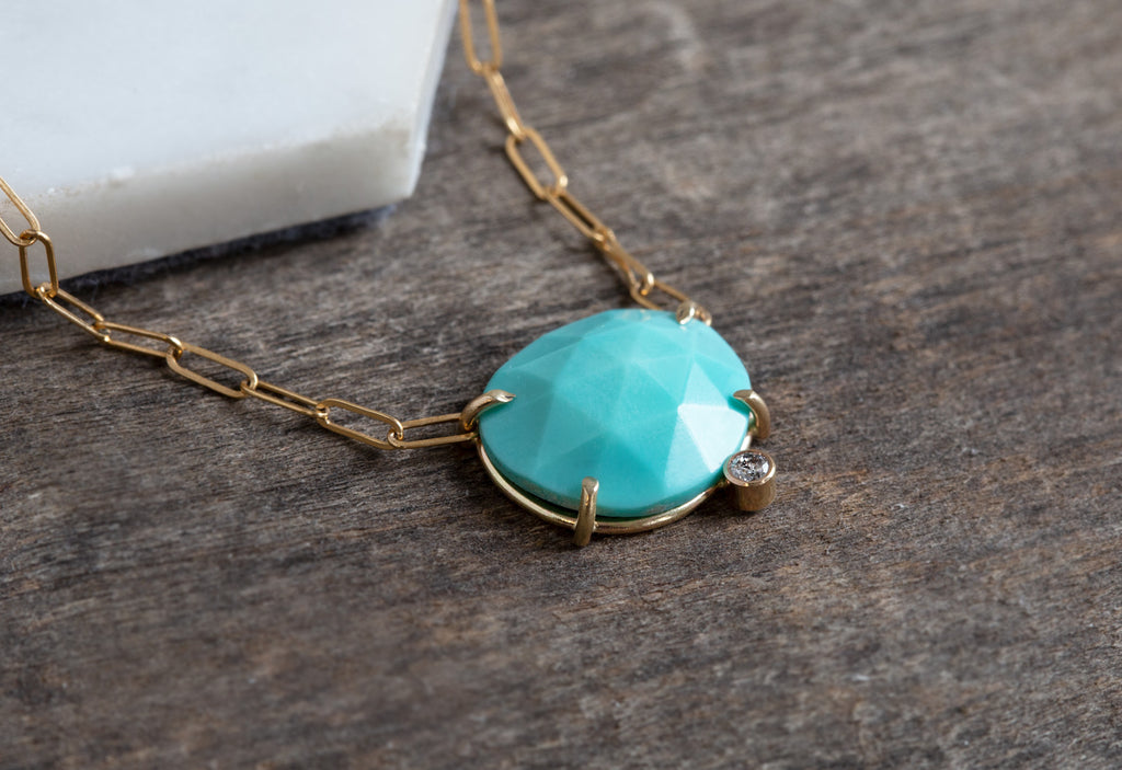 Rose Cut Turquoise Diamond Pendant Necklace on Wood Table