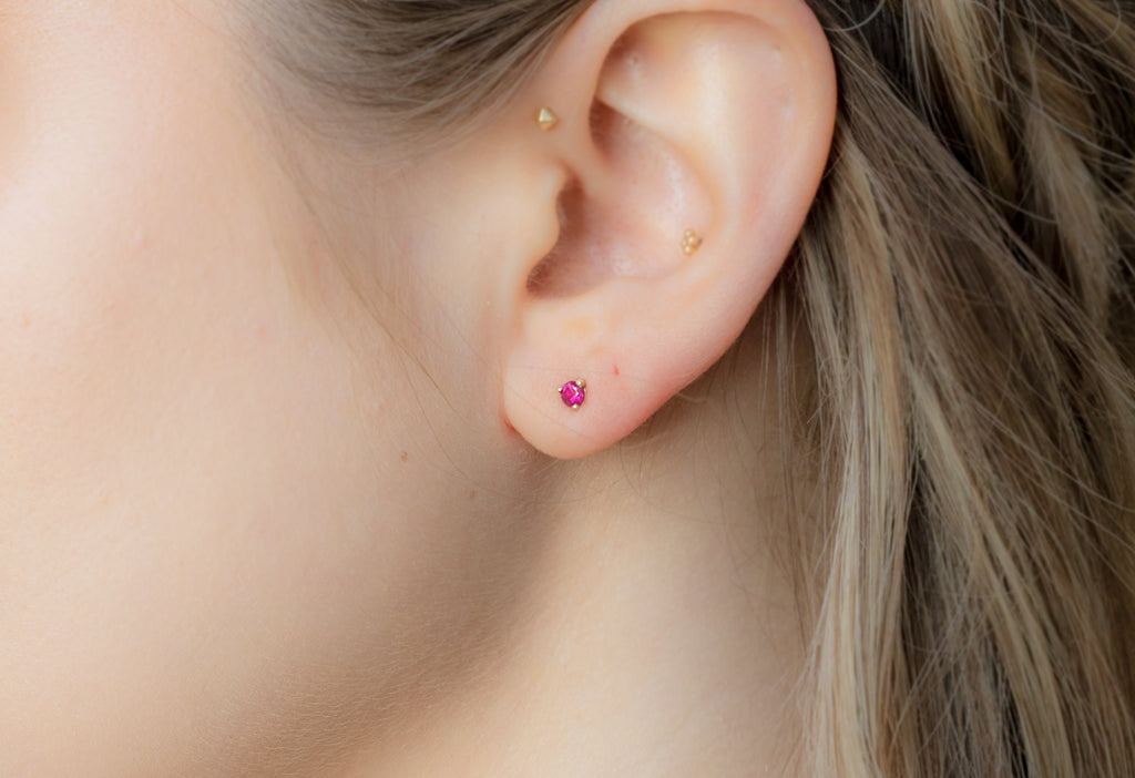 Round-Cut Ruby Stud Earrings on Model