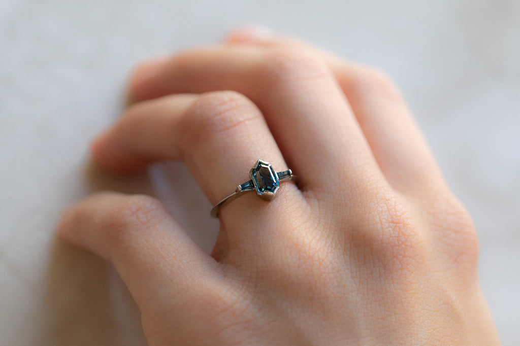 The Ash Ring with a Sapphire Hexagon on Model