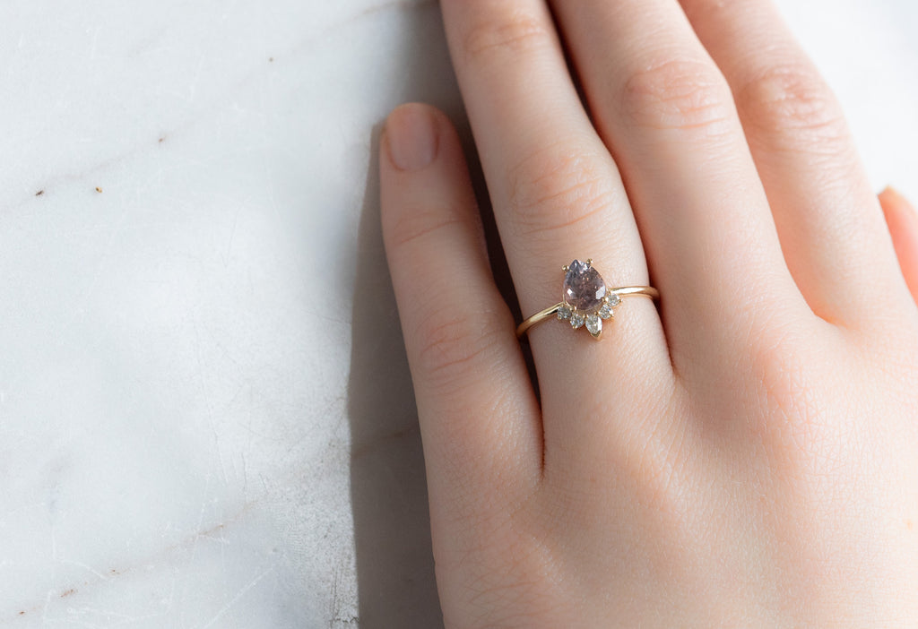 The Aster Ring with a Color Changing Montana Sapphire on Model