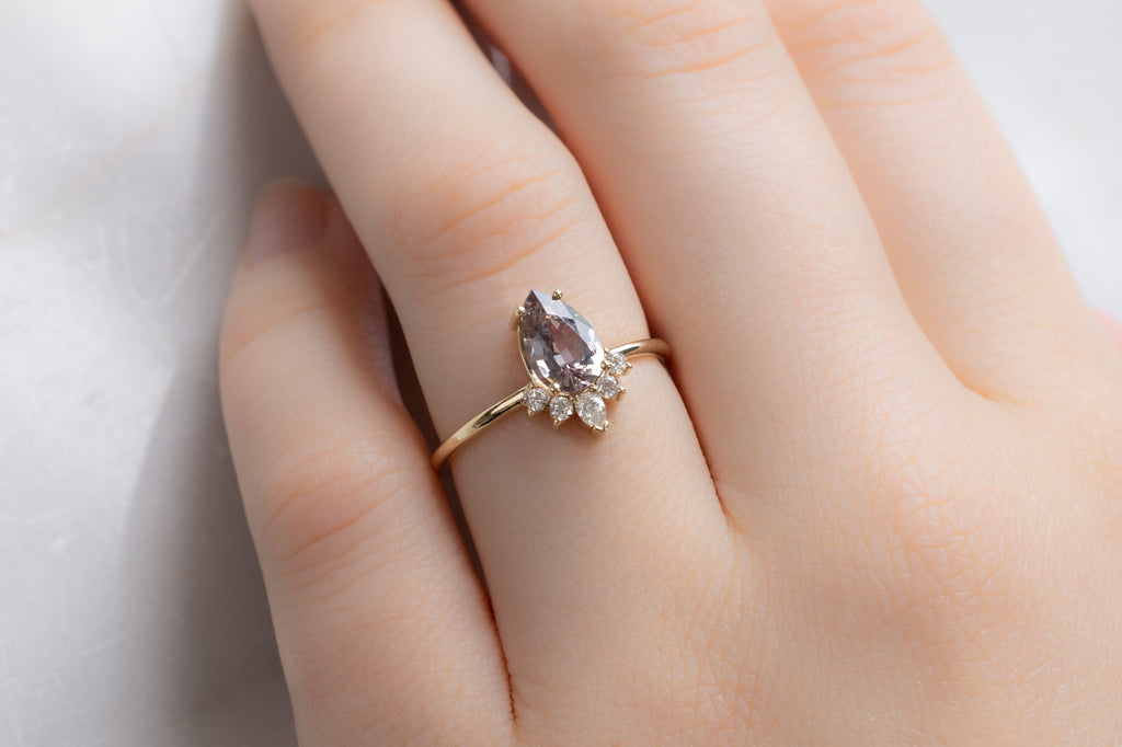 The Aster Ring with a Grey Violet Tanzanite on Model