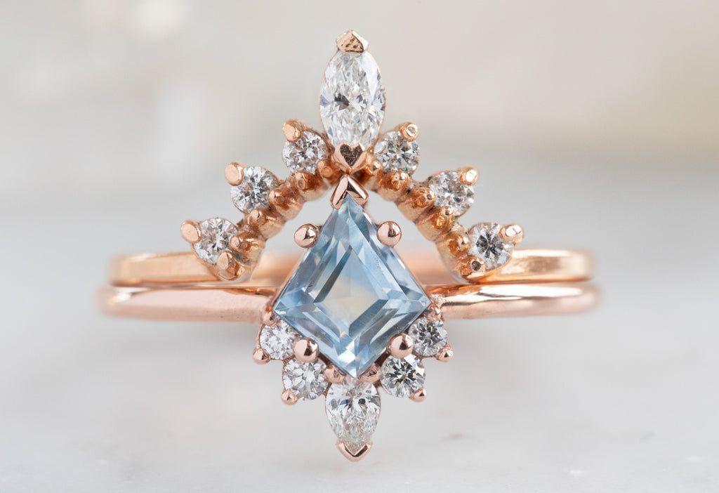 The Aster Ring with a Kite-Shaped Pastel Sapphire with White Diamond Sunburst Stacking Band