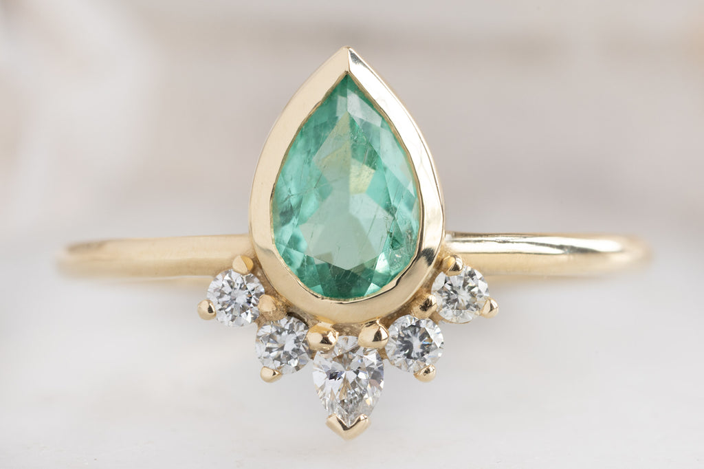 The Aster Ring with a Pear-Cut Emerald