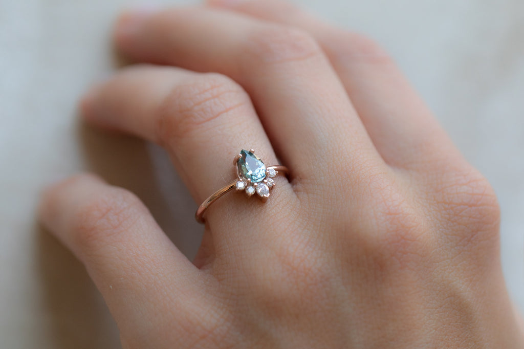 The Aster Ring with a Pear-Cut Sapphire On Model