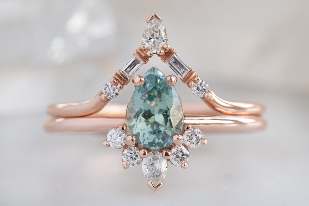 The Aster Ring with a Pear-Cut Sapphire With Stacking Band