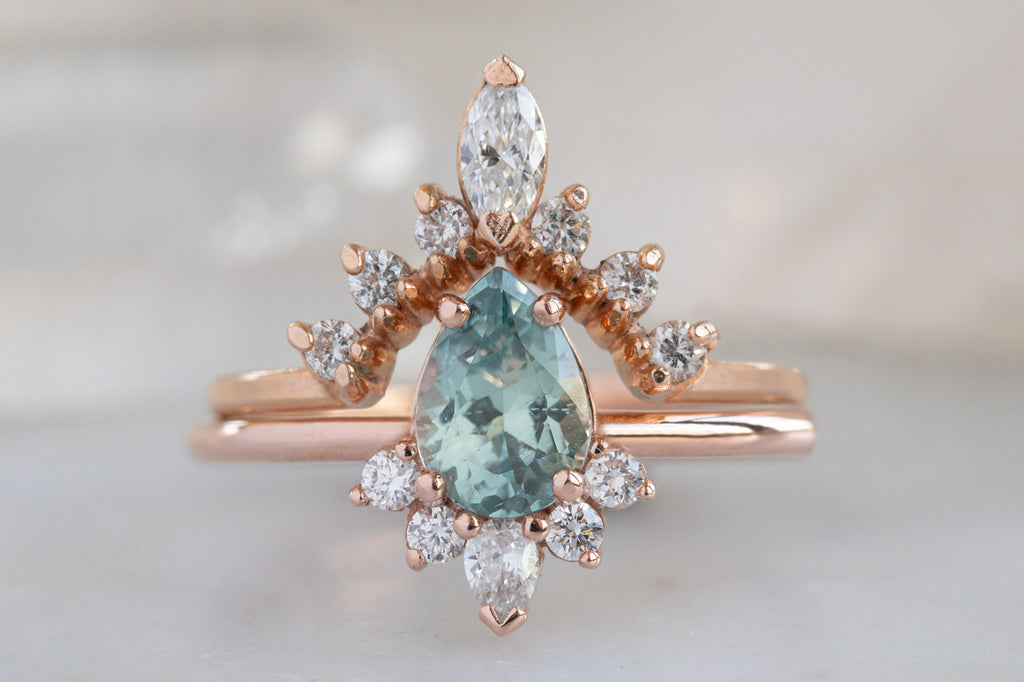 The Aster Ring with a Pear-Cut Sapphire With Stacking Band