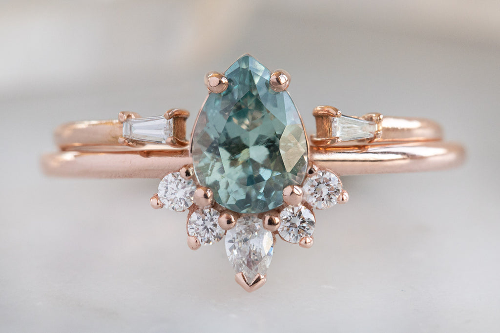 The Aster Ring with a Pear-Cut Sapphire With Stacking Band