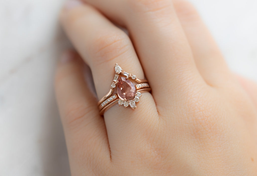 The Aster Ring with a Pear-Cut Sunstone with White Diamond Stacking Bands