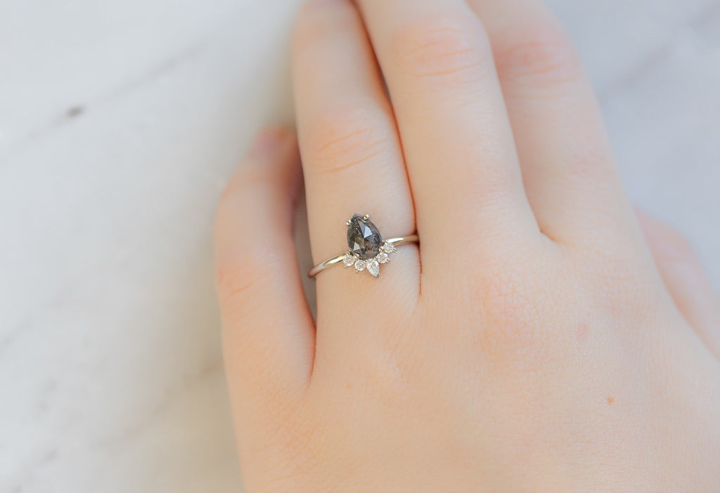 The Aster Ring with a Rose-Cut Black Diamond on Model