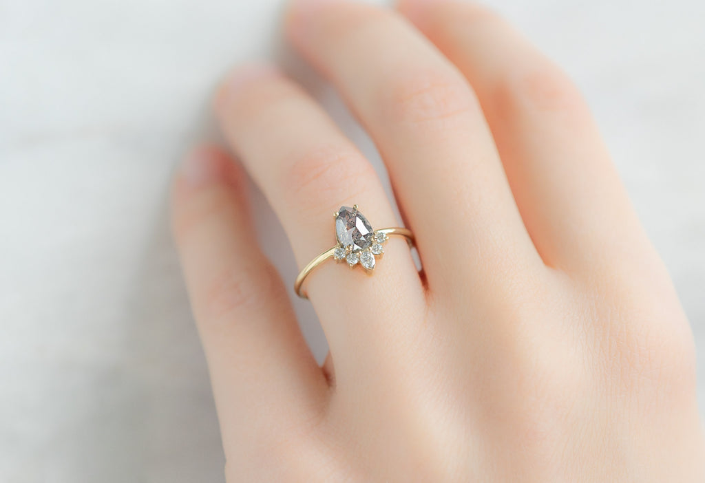 The Aster Ring with a Rose-Cut Silvery Grey Diamond on Model