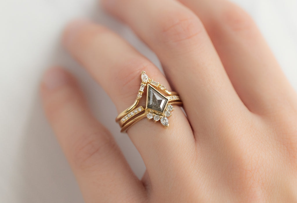 The Aster Ring with a Salt and Pepper Kite Diamond with White Diamond Stacking Bands on Model