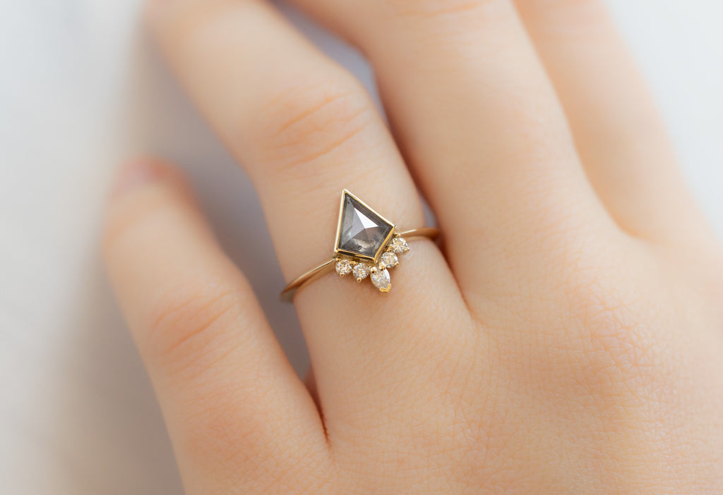 The Aster Ring with a Silvery Grey Kite-Shaped Diamond on Model