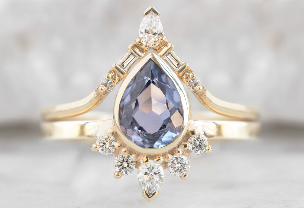 The Aster Ring with a Pear-Cut Violet Sapphire with White Diamond Tiara Stacking Band