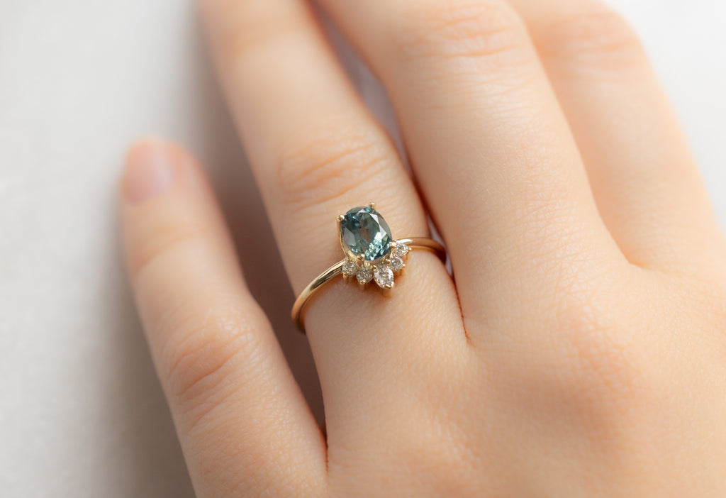 The Aster Ring with an Oval-Cut Montana Sapphire on Model