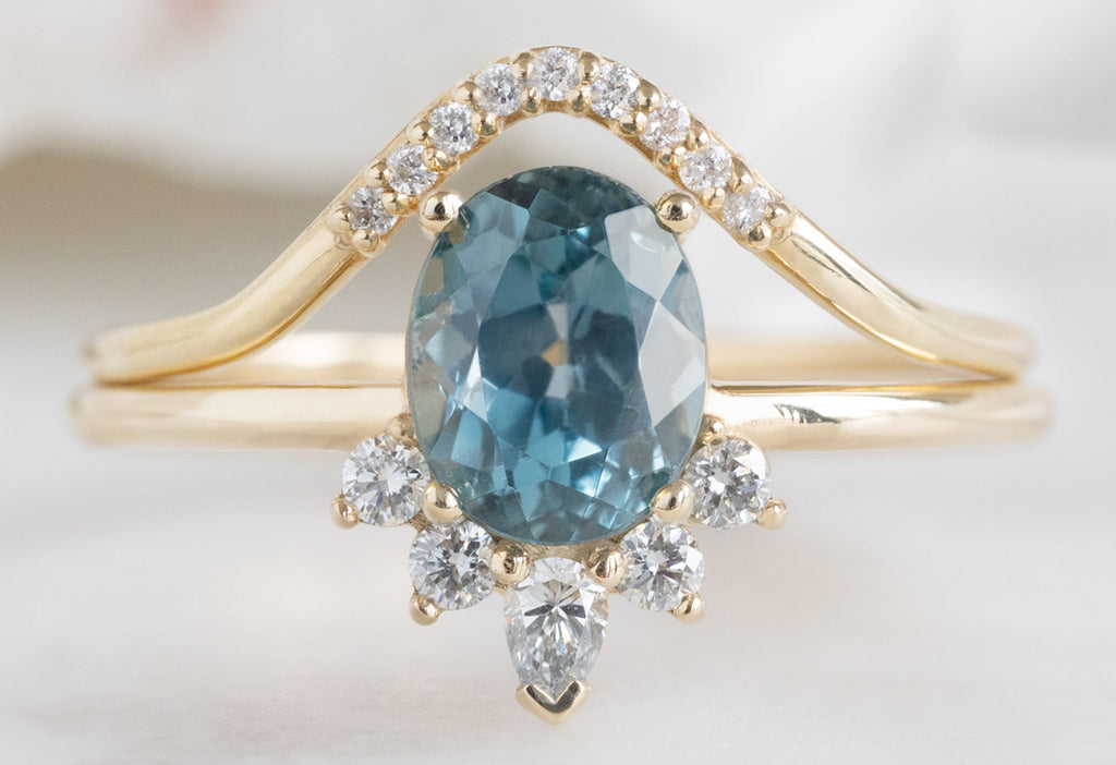 The Aster Ring with an Oval-Cut Montana Sapphire with Pavé Peak Stacking Band