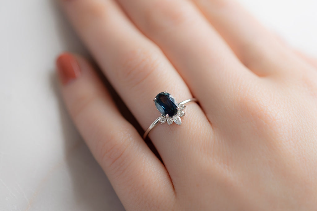 The Aster Ring with an Oval-Cut Sapphire on Model