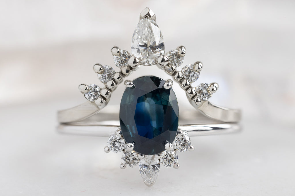 The Aster Ring with an Oval-Cut Sapphire with White Diamond Wedding Band