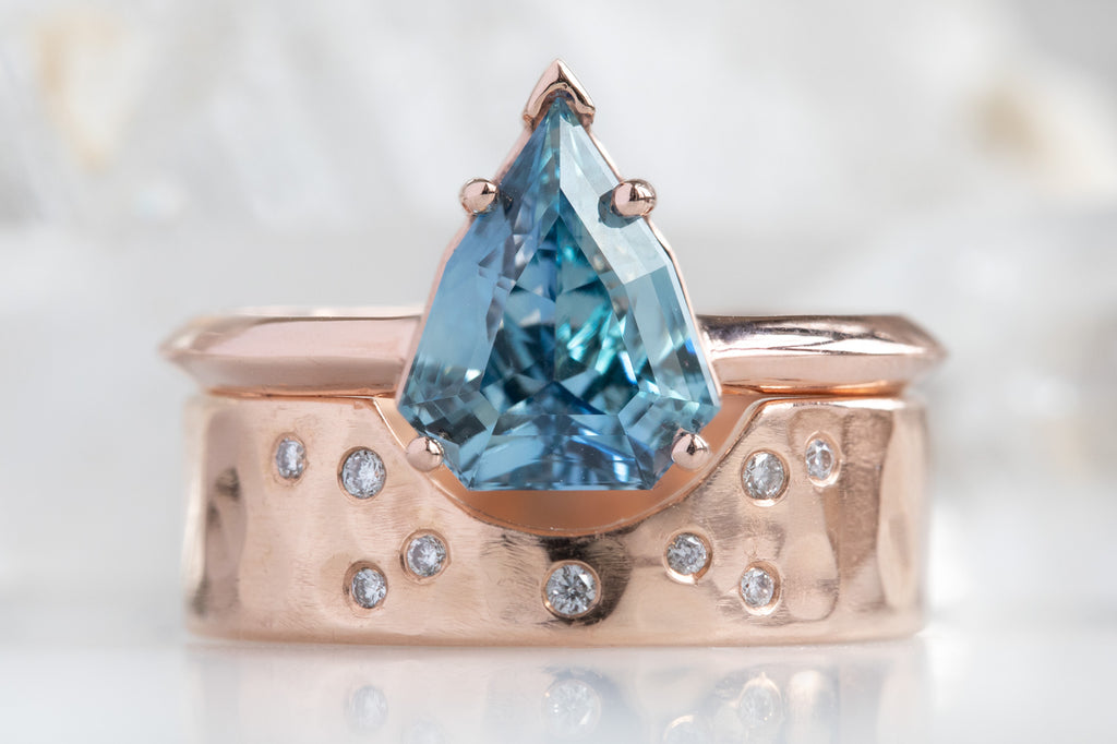 The Bryn Ring With a Shield Cut Sapphire With Stacking Band