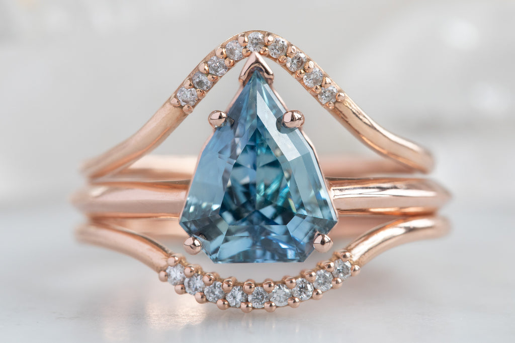 The Sage Ring With a Shield Cut Sapphire With Stacking Band