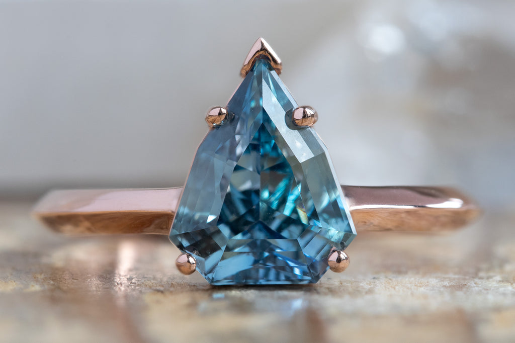 The Bryn Ring With a Shield Cut Sapphire