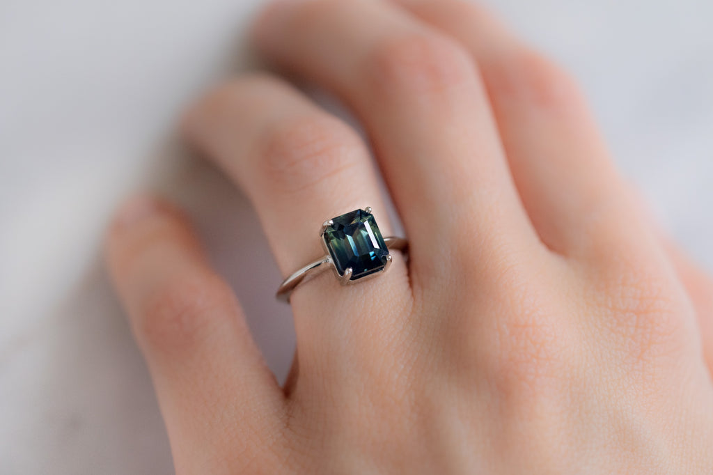 The Bryn Ring with a Bicolor Sapphire on Model