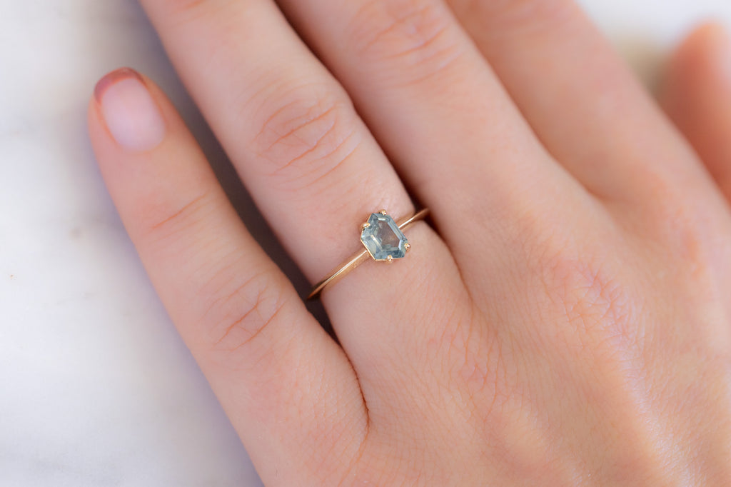 The Bryn Ring with a Geometric Montana Sapphire on Model