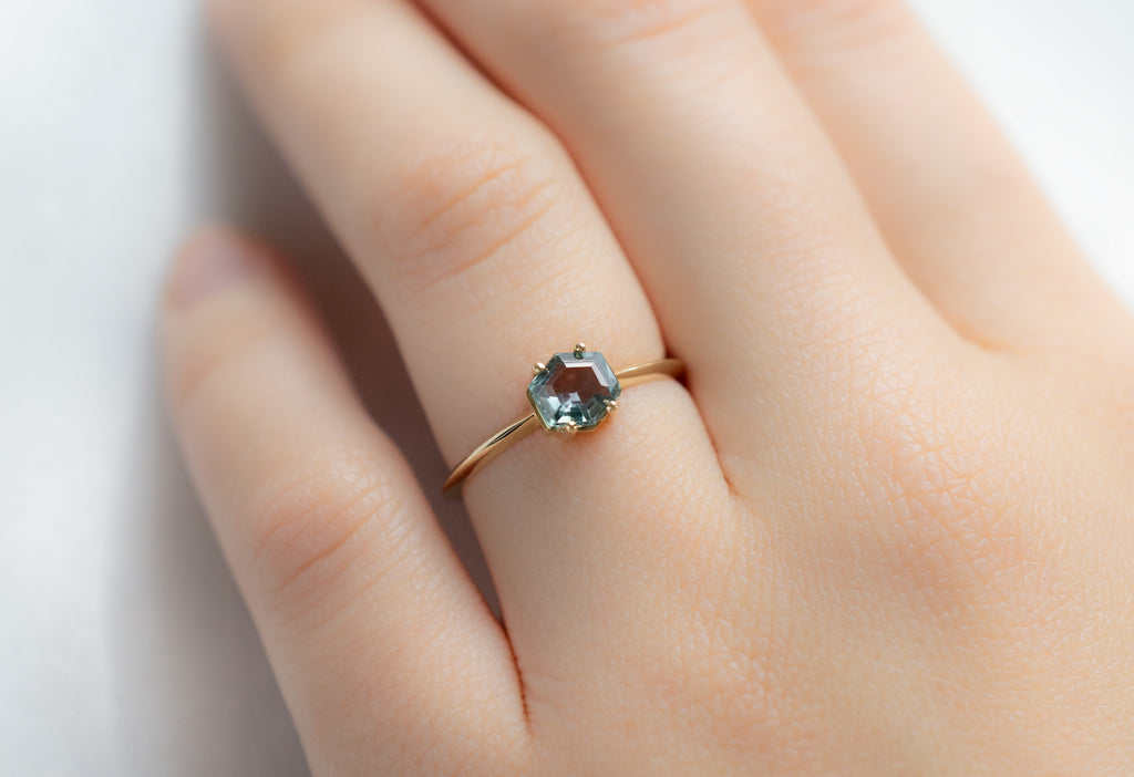 The Bryn Ring with a Montana Sapphire Hexagon on Model