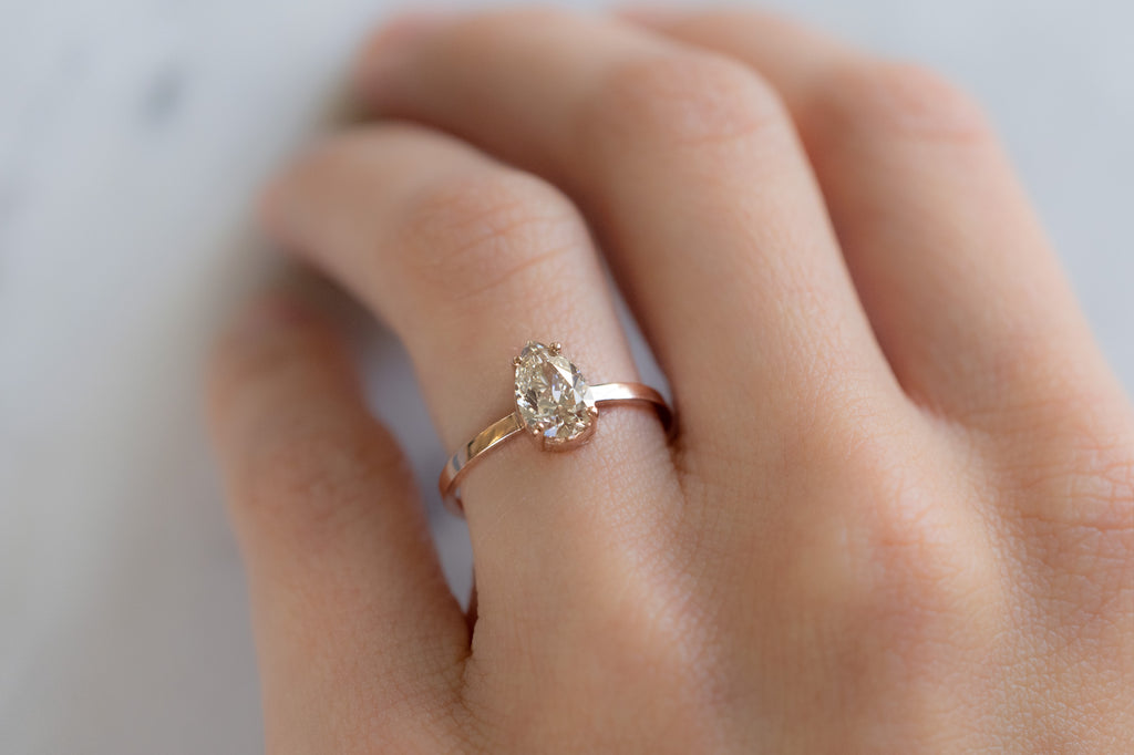 The Bryn Ring with a Pear Cut Champagne Diamond on Model