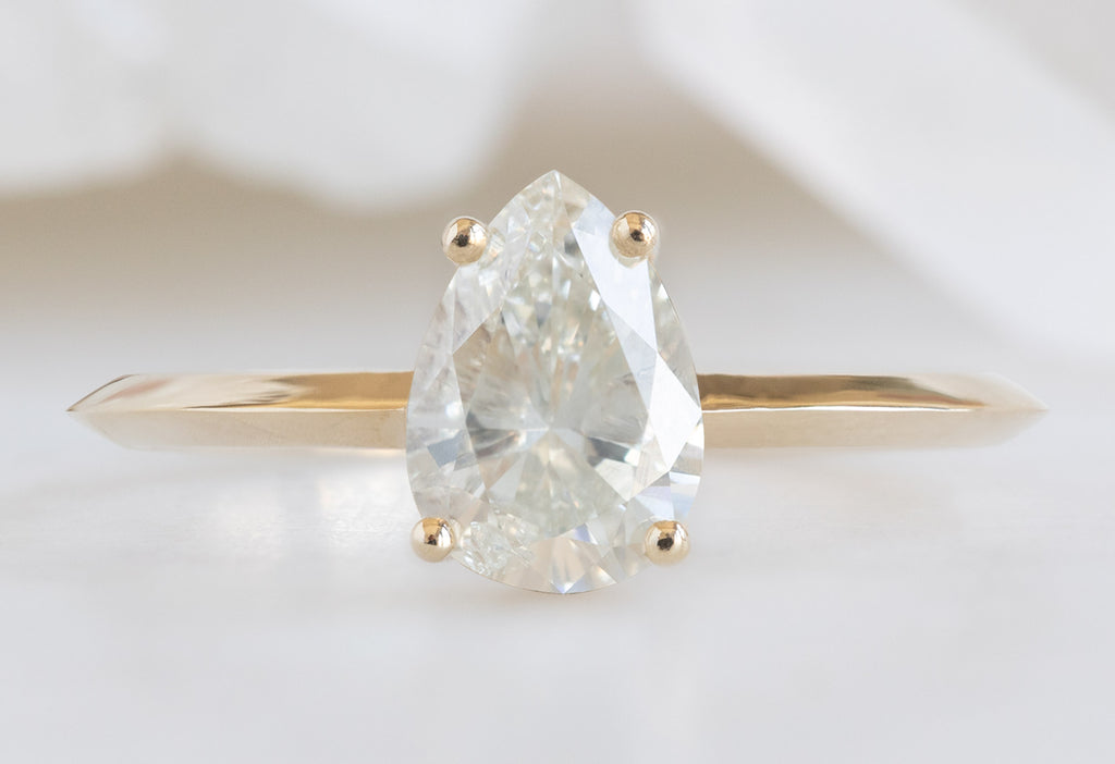 The Bryn Ring with a Pear-Cut White Diamond