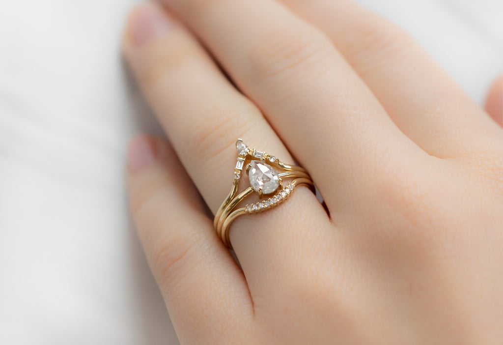The Bryn Ring with a Rose-Cut Icy White Diamond with White Diamond Stacking Bands on Model